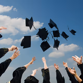 graduate students throwing hat